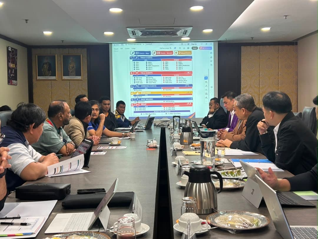 Athletics events for men and women on the screen during the event confirmation meeting.
