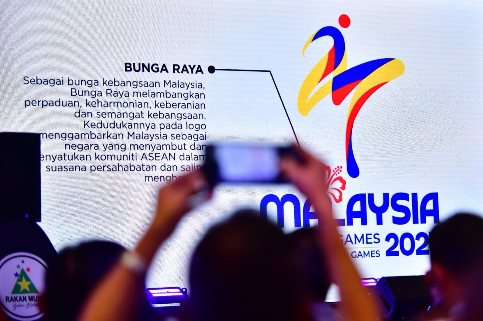 A screen explaining the Bunga Raya in the Malaysia 2027 logo.